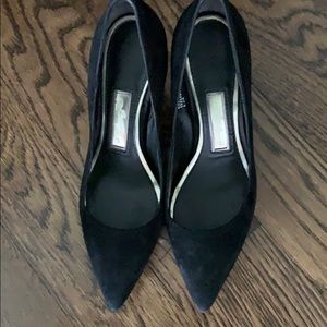 Black suede pumps